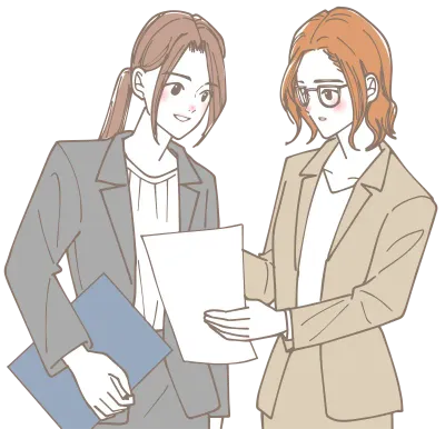 資料を見て話し合う若い女性のチーム