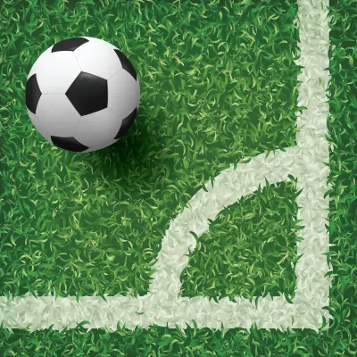 Soccer football ball in corner area of soccer field.