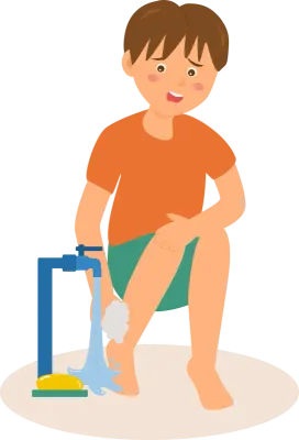 A boy is washing his legs.