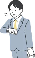 時計を確認するビジネスマン