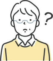 考え事をする眼鏡をかけた高齢者