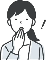 何かに驚くスーツを着た女性
