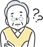 考え事をする眼鏡をかけた高齢の男性