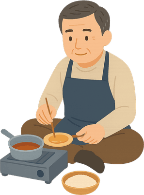 앉아서 달고나 만드는 아저씨