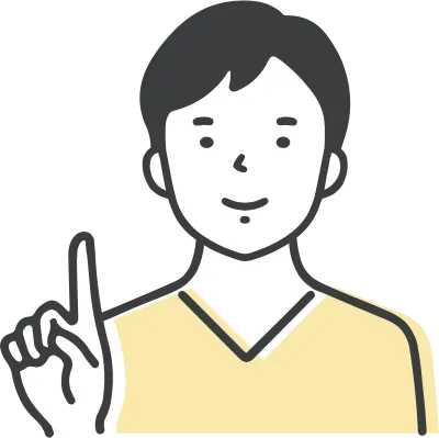 指差しをする黒髪の若い男性