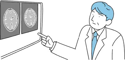 A male doctor pointing to an image taken by an MRI of the brain