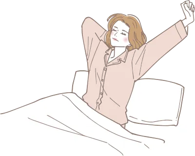 朝爽やかに起きて伸びをする女性