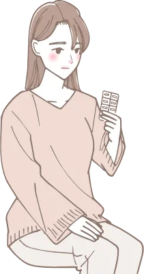薬を見ている女性のイラスト