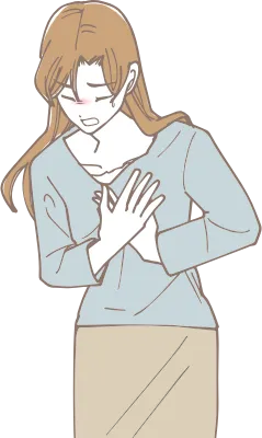 胸を押さえて苦しむ女性