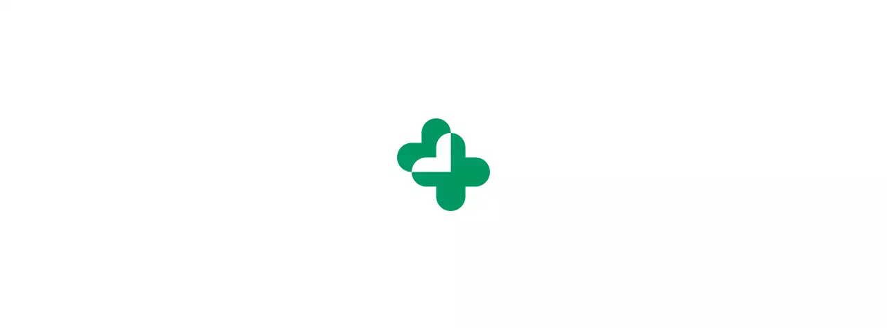 Hospital stationery with a four-leaf clover logo