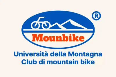 Club di mountain bike con un logo di tipo semplice con una montagna e delle biciclette