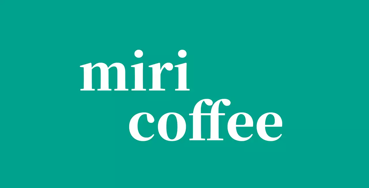 영어로 된 로고가 있는 청록색 배경의 카페 발매트 