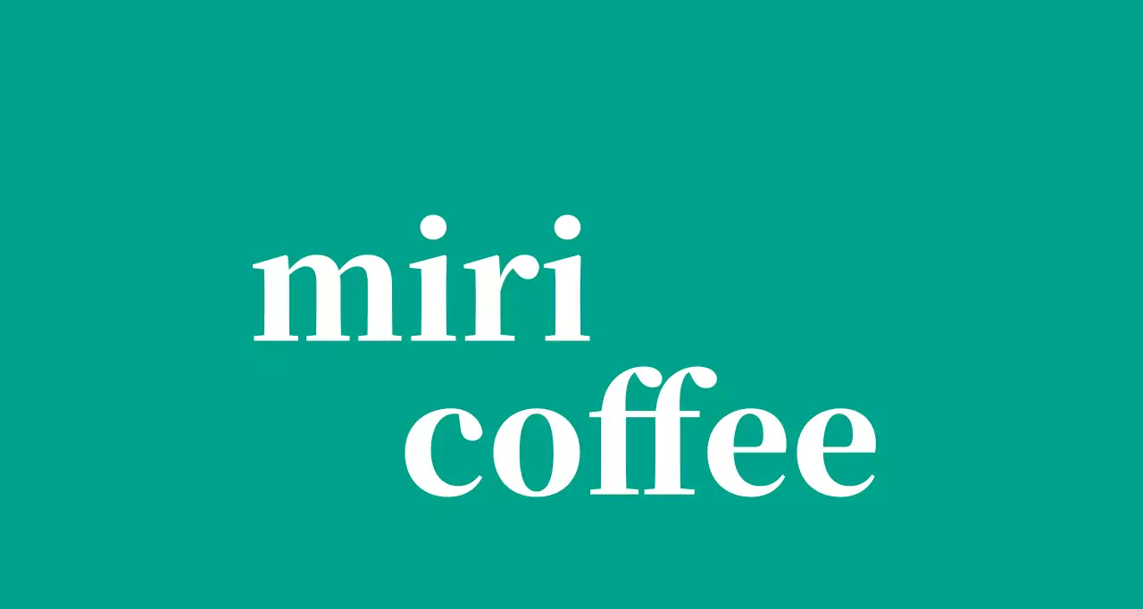 영어로 된 로고가 있는 청록색 배경의 카페 발매트 