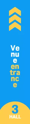 Desain yang bersih dengan warna kuning dan biru untuk memandu lokasi pintu masuk venue