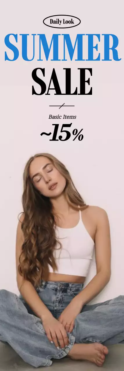 Clothing model sitting on the floor with a gray background