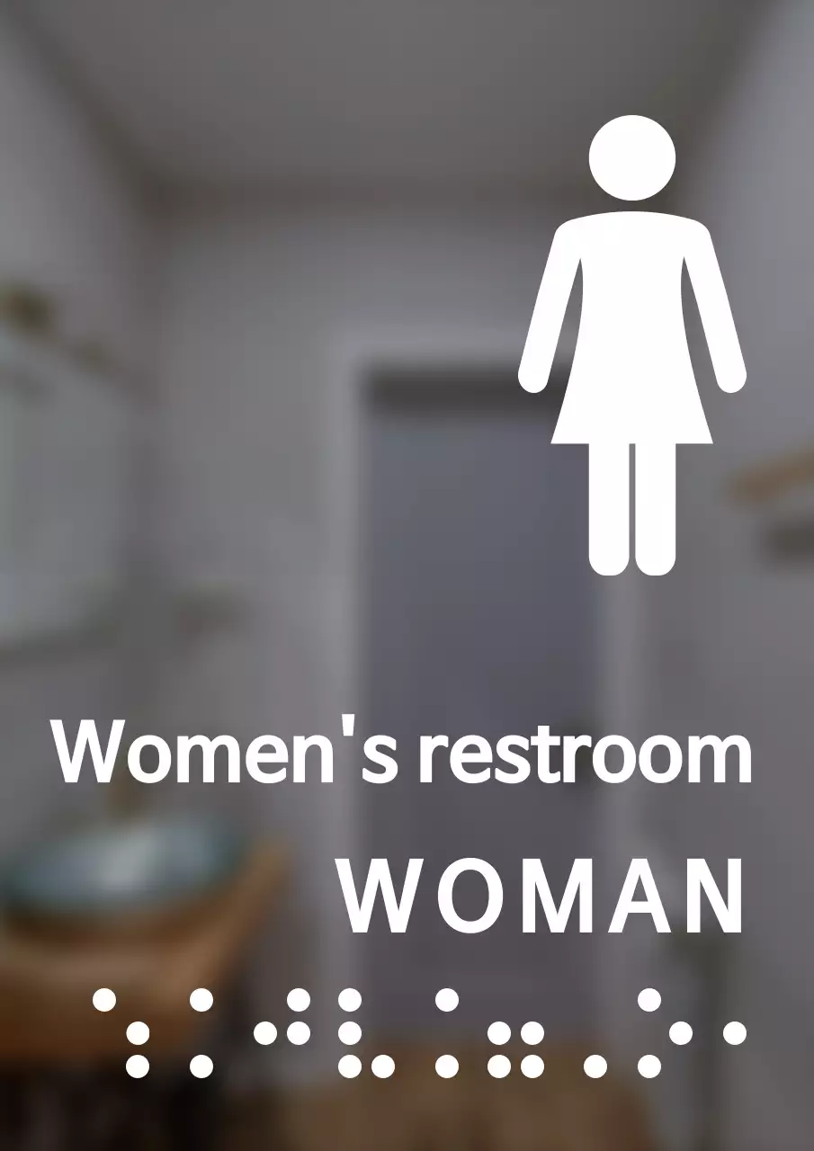Papan nama untuk toilet wanita dalam huruf braille dengan gaya yang bersih