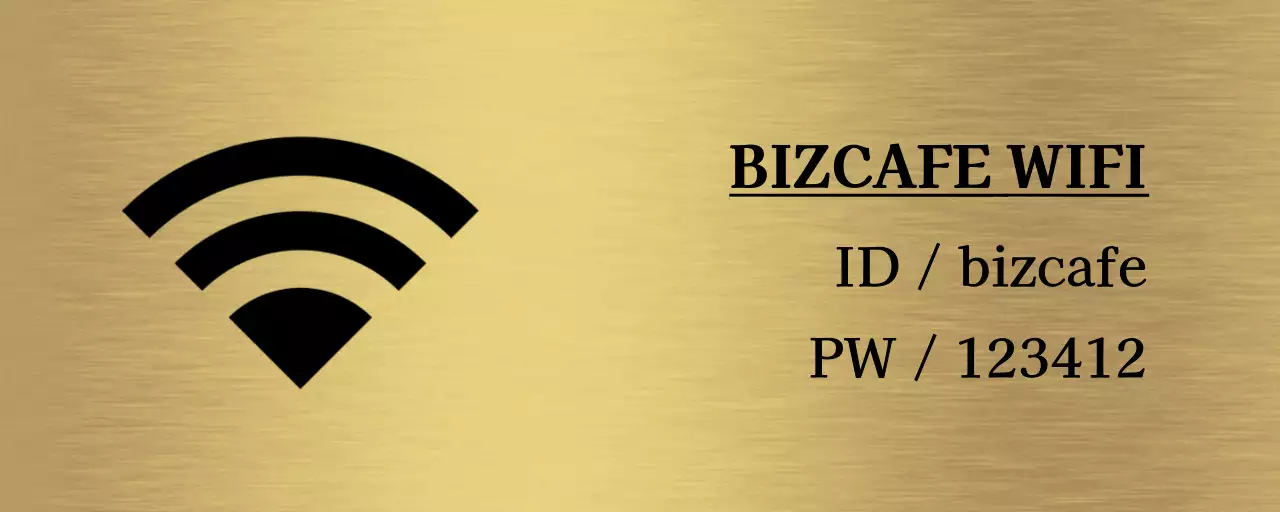 Một biển hiệu đơn giản với thông tin vị trí cửa hàng Wi-Fi và các biểu tượng đơn giản màu đen.