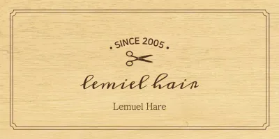 A classic-looking hair salon sign with black text and a scissors illustration