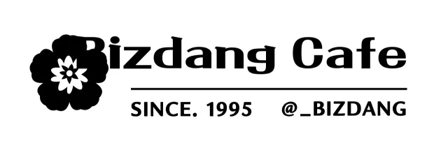 Cafe merchandise with a symbolic logo of a black flower and the name of the cafe.