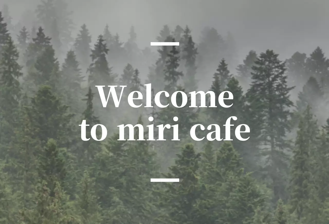 English-language cafe balsa with a sentimental sign with a forest photo in the background