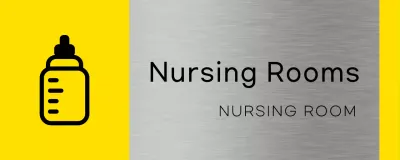 Simple placeholder signage with yellow and black building lactation room names and a square baby bottle icon.