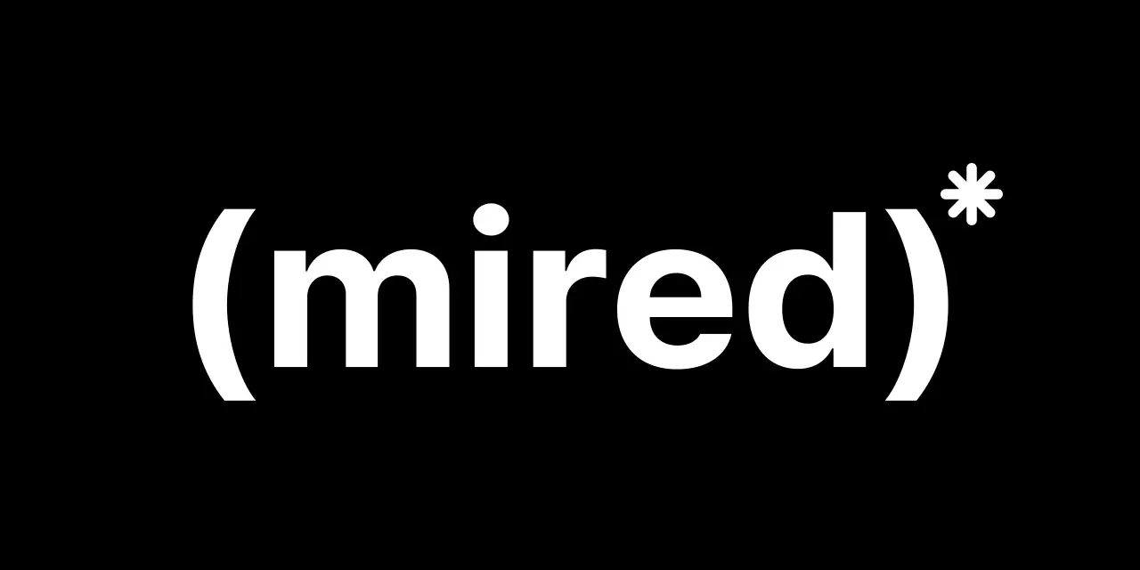 Shop logo with pink and black brackets and text