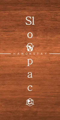 Hanok stay design with white eaves and a simplified symbolic logo of a landscape