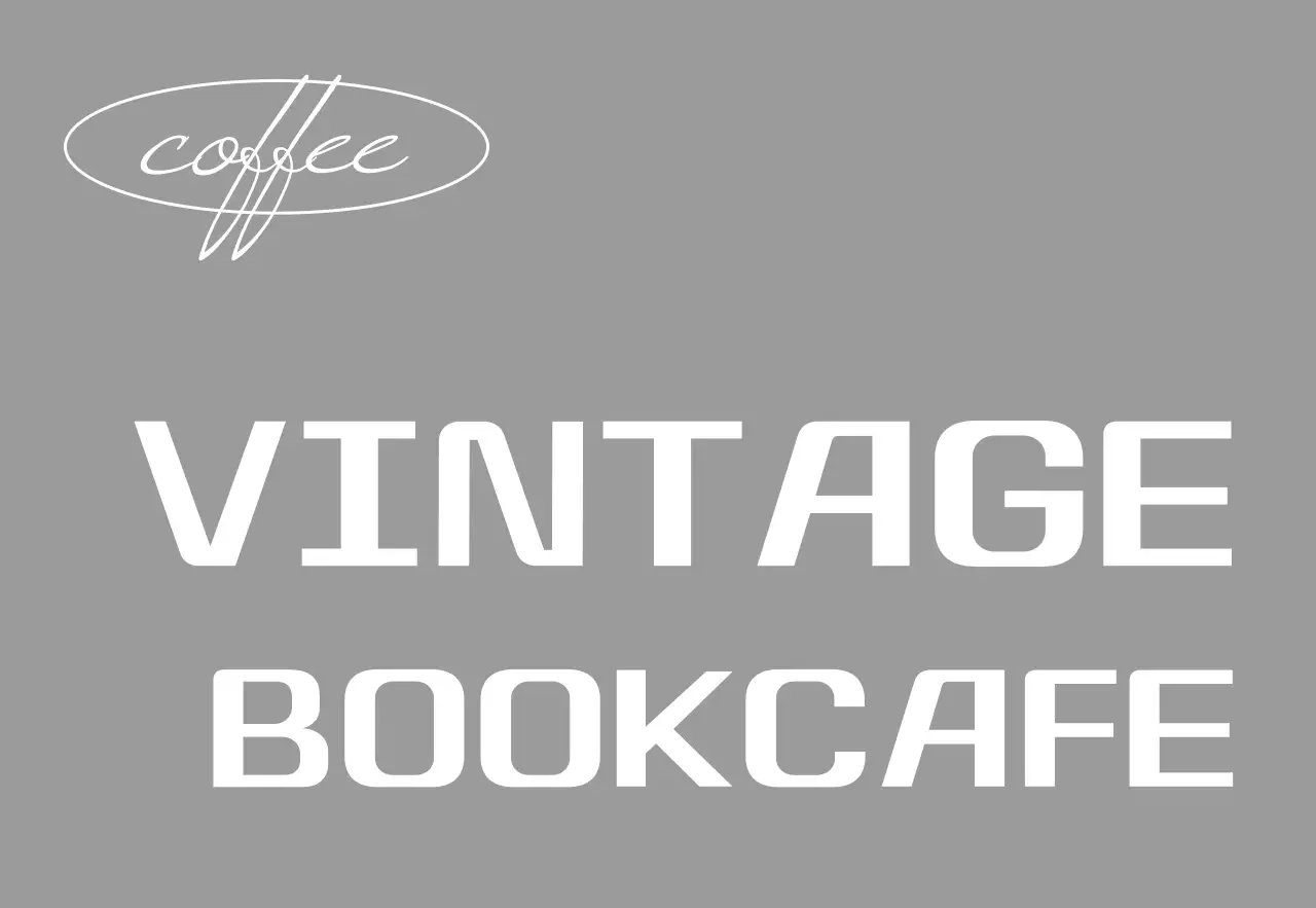 A simple storefront sign with black and white vintage bookcafe text and circular line shapes.