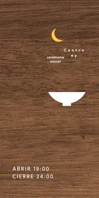 Un sencillo cartel de restaurante nocturno con texto en blanco y amarillo y una ilustración de una luna en forma de cuenco.