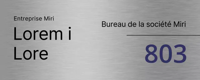 Signalisation de l'entreprise en noir et bleu marine avec noms de lieux et lignes