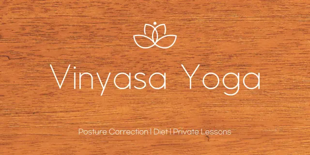 Simple wooden plaque with yoga school-related text and logo illustration