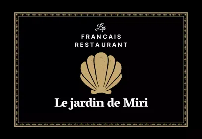 Un restaurant français avec un cadre doré