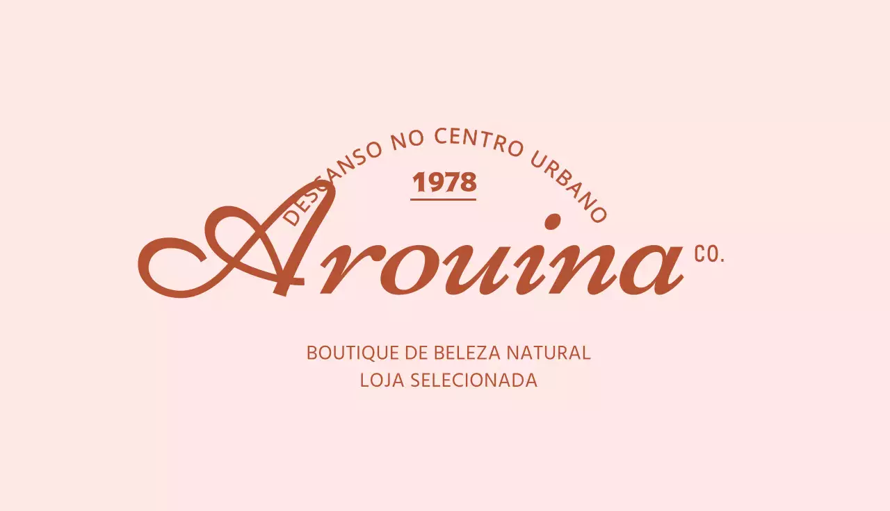 Cartão de visita de uma loja editorial com logótipo de emblema cursivo sobre fundo cor-de-rosa
