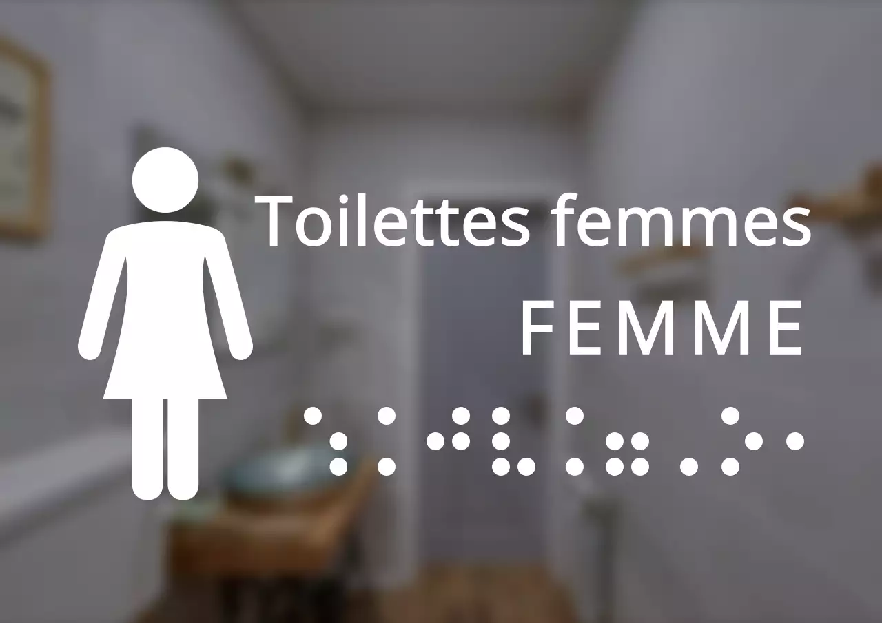 Signalisation des toilettes pour femmes en braille dans un style épuré
