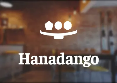 Logotipo de una tienda de dango de estilo sencillo
