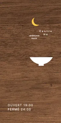 Enseigne de restaurant simple avec texte blanc et jaune et illustration d'une lune en forme de bol.