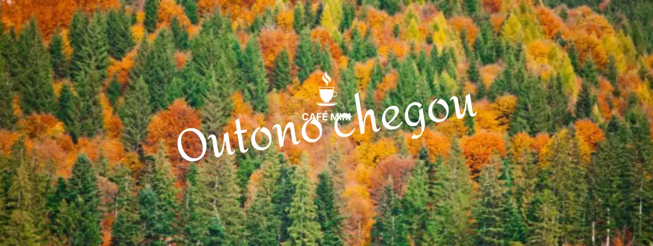 Café outonal com toques cursivos num cenário montanhoso de folhas de outono coloridas