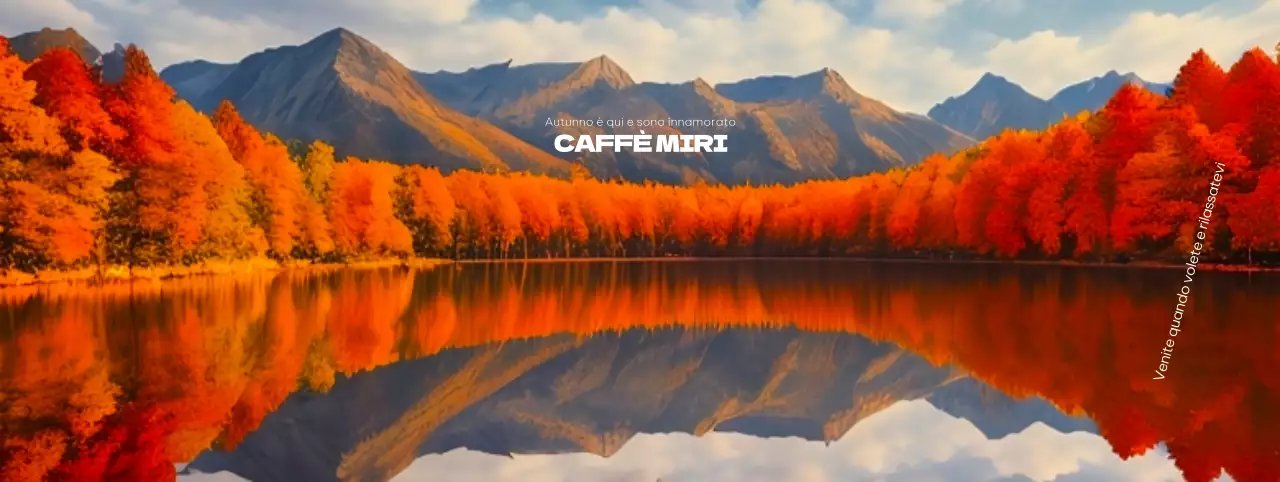 Un caffè dalle atmosfere autunnali con alberi di acero rosso brillante e uno sfondo lacustre