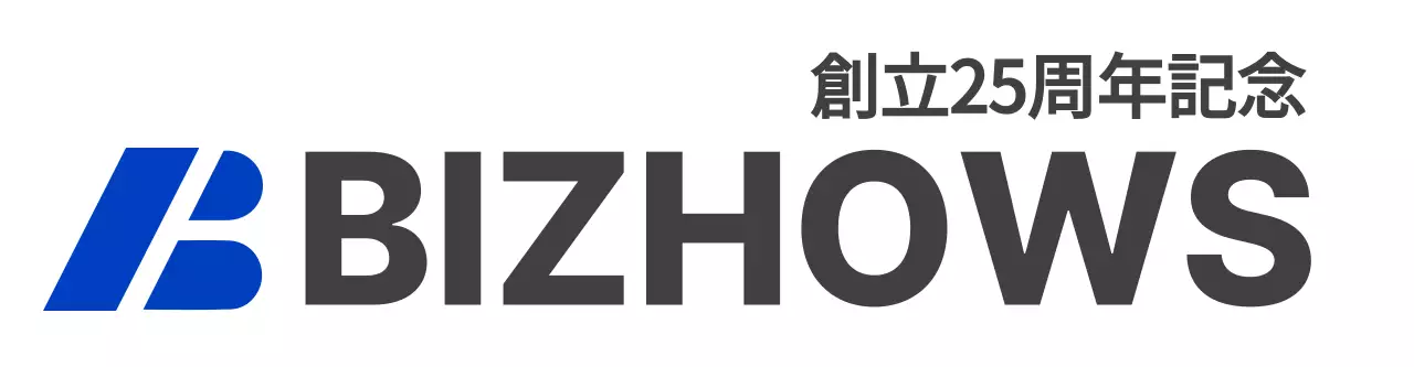 青とグレーのシンボルロゴが入った創立記念用企業ロゴ。
