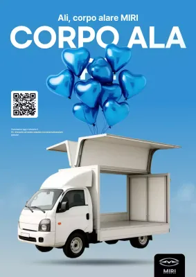 Pubblicità di un'auto moderna color azzurro cielo