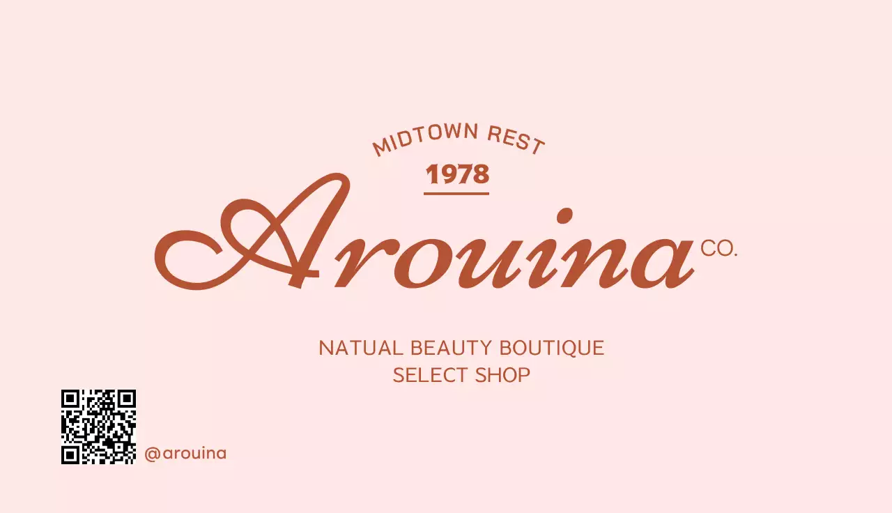 ピンクの背景の筆記体エンブレムロゴが描かれたエディトリアルショップ名刺