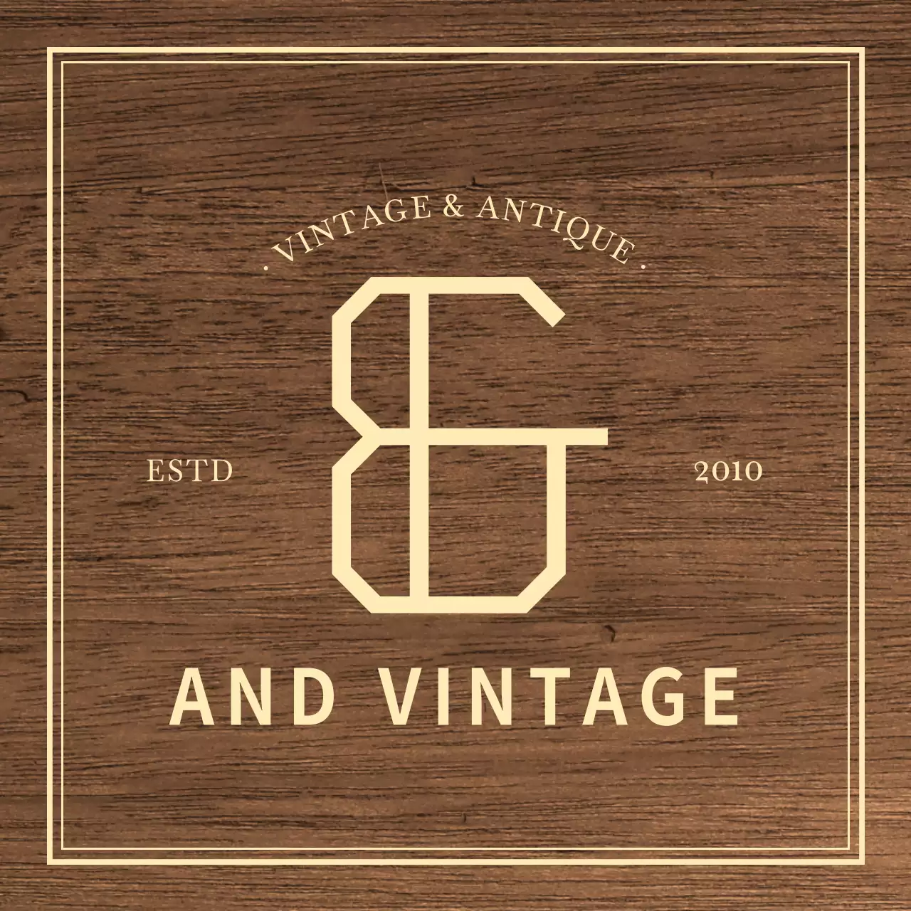 アイボリー色のテキストで構成されたクラシックな印象のヴィンテージアンティークショップの文字板