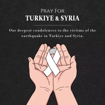 A memorial message holding a black concept ribbon